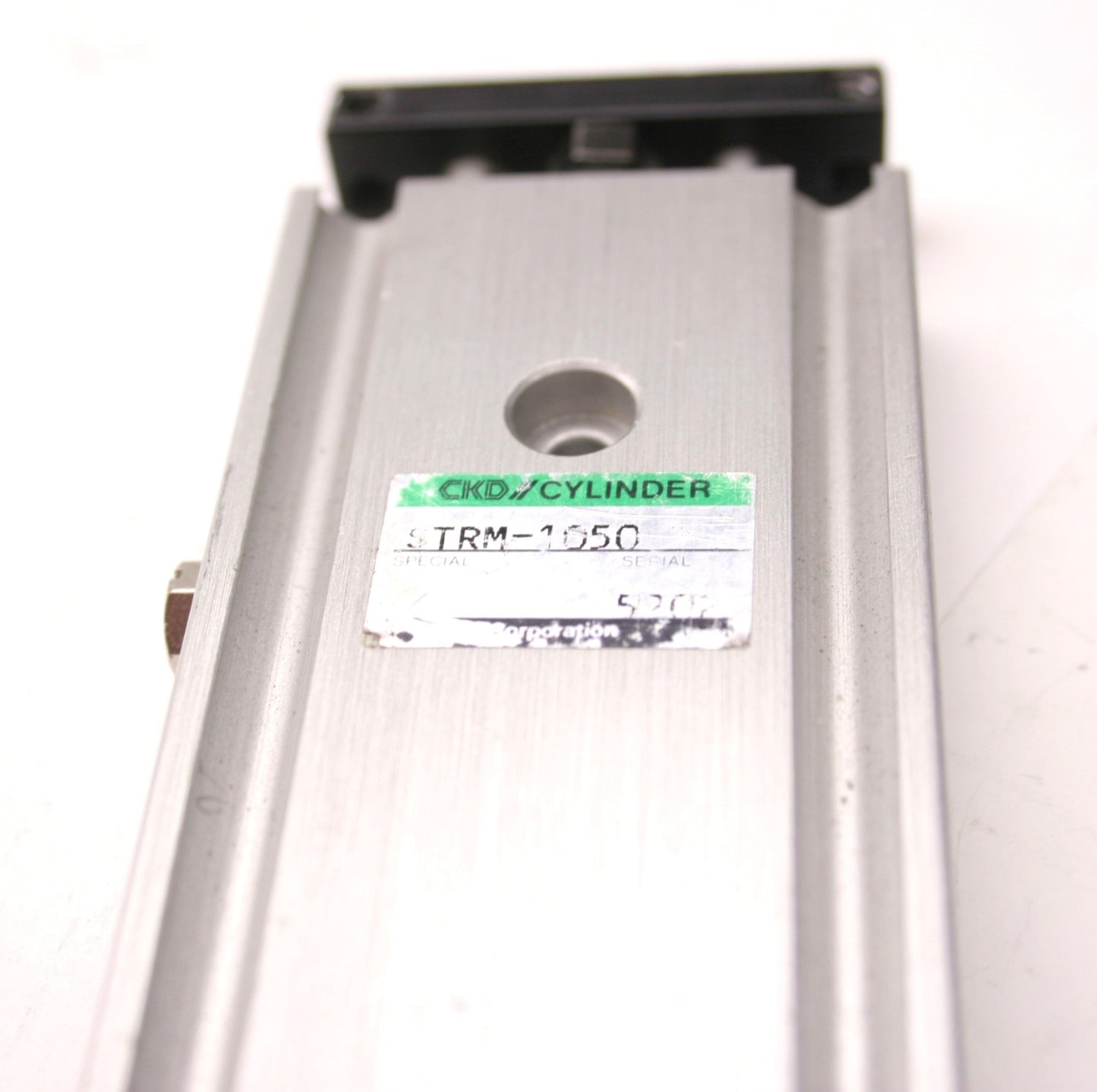 Used CKD STRM-1050 Pneumatic Guided Cylinder, 2" Stroke, 10/32-M5x0.8 Ports