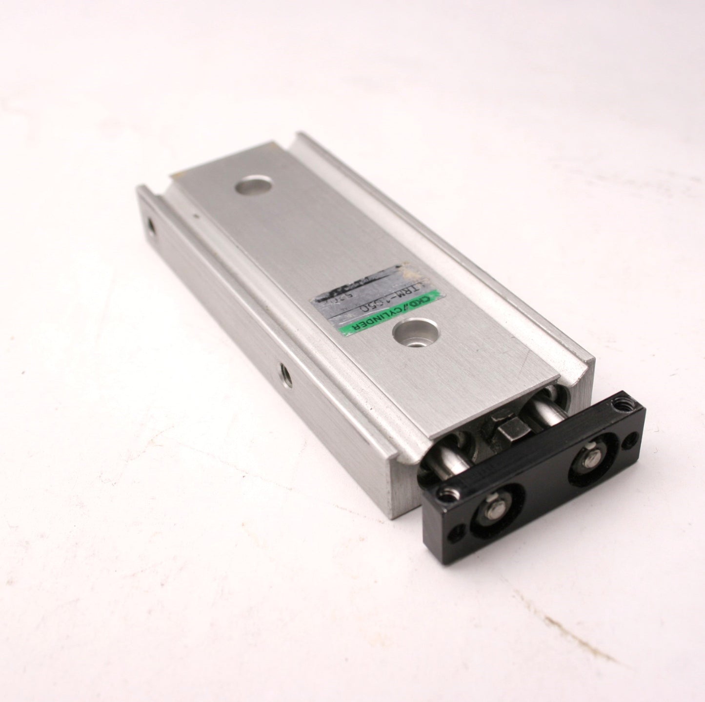 Used CKD STRM-1050 Pneumatic Guided Cylinder, 2" Stroke, 10/32-M5x0.8 Ports