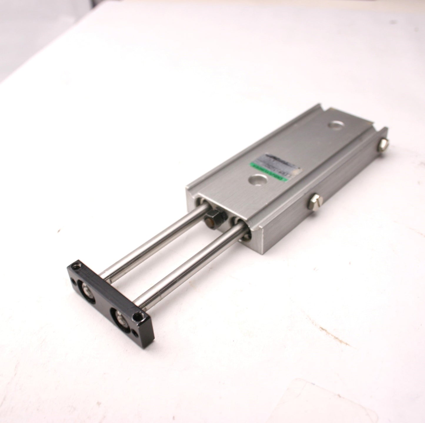 Used CKD STRM-1050 Pneumatic Guided Cylinder, 2" Stroke, 10/32-M5x0.8 Ports