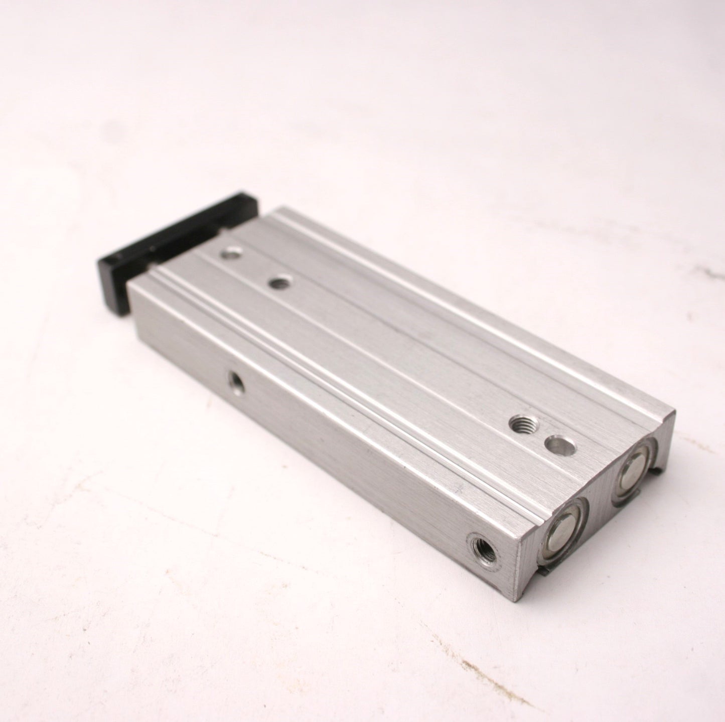 Used CKD STRM-1050 Pneumatic Guided Cylinder, 2" Stroke, 10/32-M5x0.8 Ports