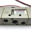 Used SMC NVF3430 Solenoid Valve, 3-Position 5-Port, 21-26VDC, 20-130psi, 1/4" NPT