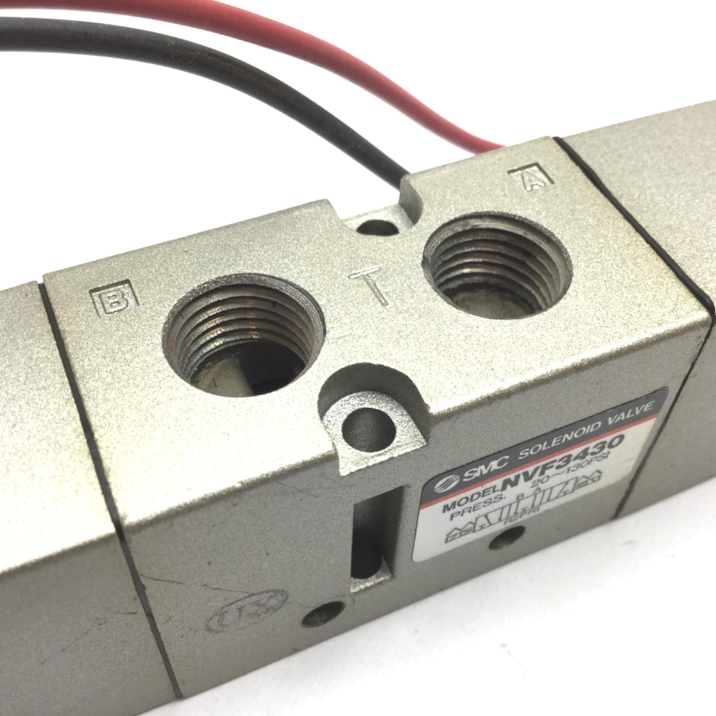 Used SMC NVF3430 Solenoid Valve, 3-Position 5-Port, 21-26VDC, 20-130psi, 1/4" NPT