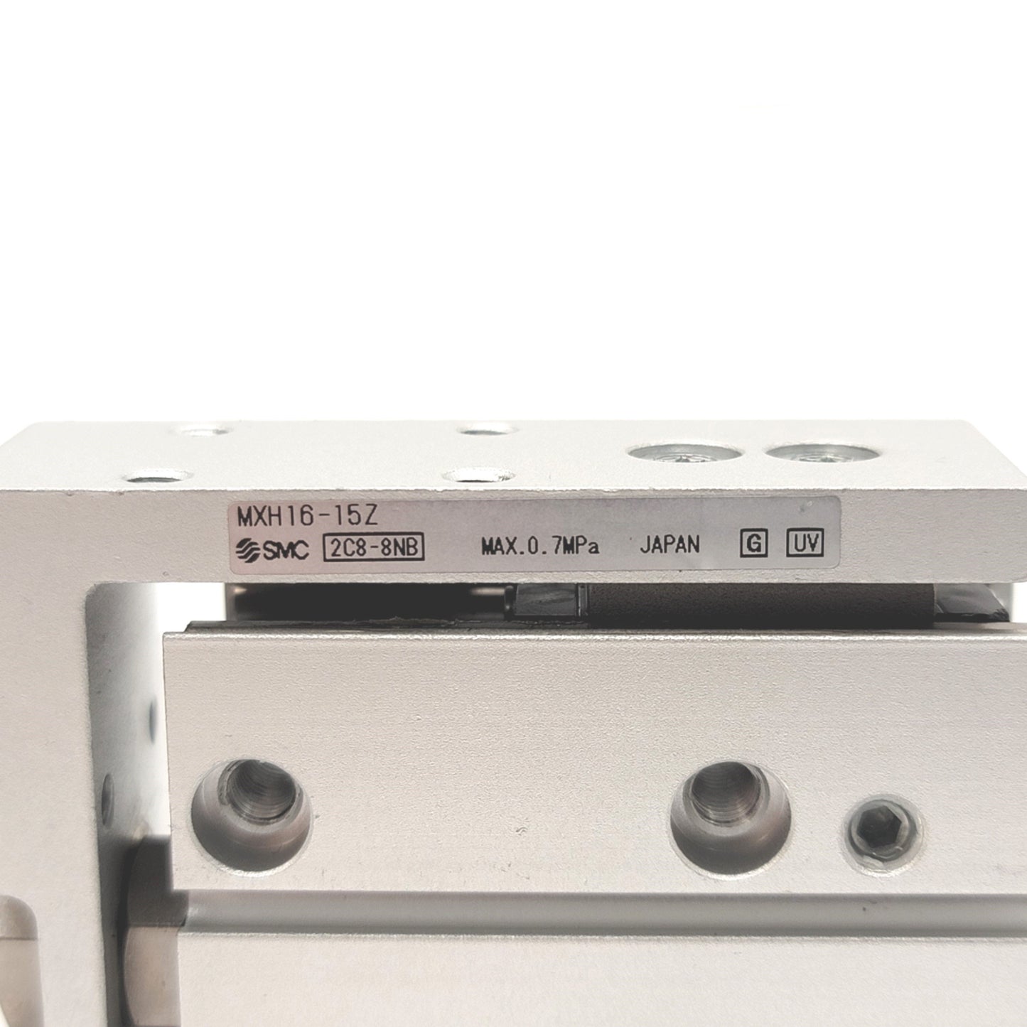 Used SMC MXH16-15Z Compact Slide Table Bore: 16mm, Stroke: 15mm, M5x0.8, 0.06-0.7MPa