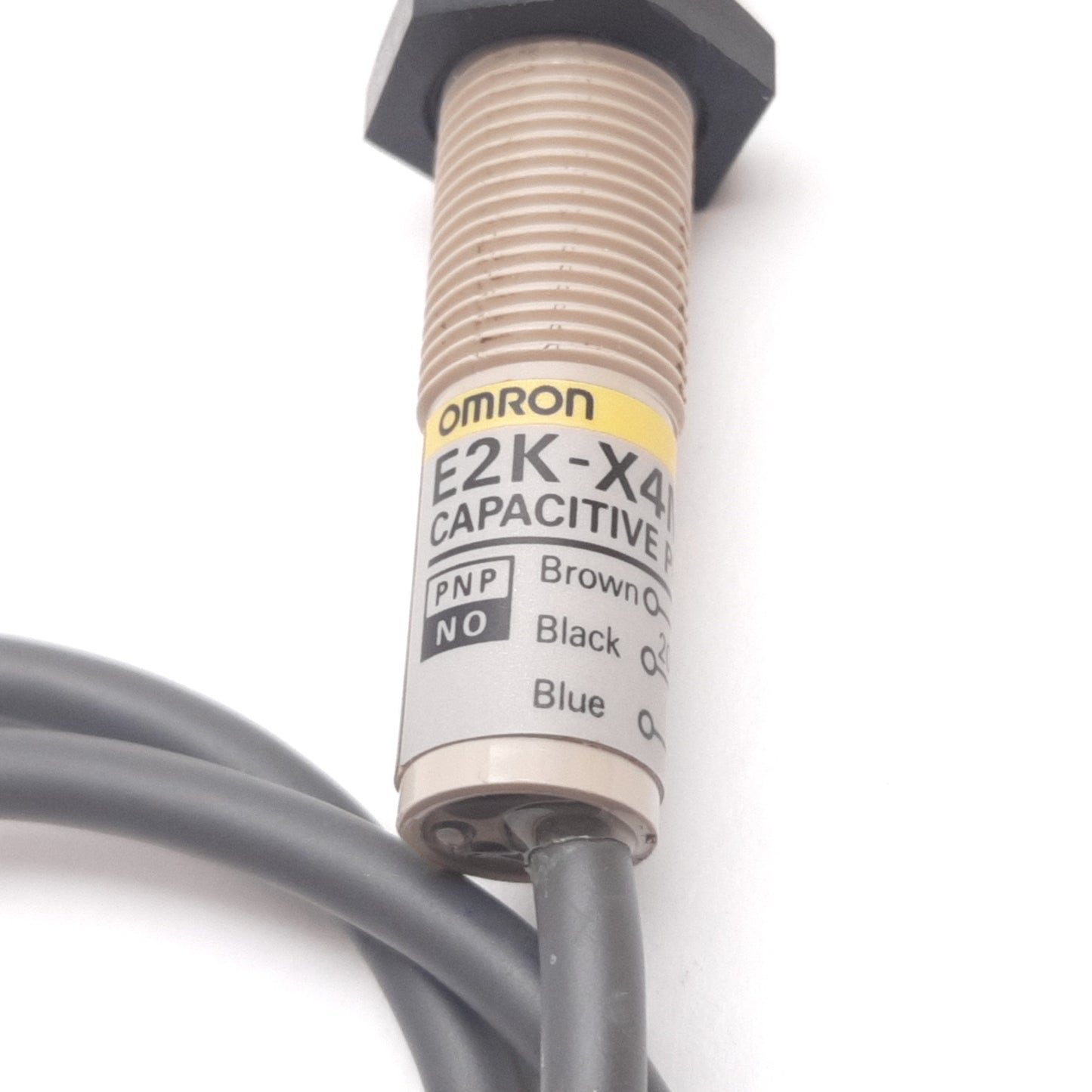 Used Omron E2K-X4MF1 Capacitive Proximity Sensor, 4mm, 12-24VDC, 200mA, PNP N/O