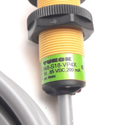 Used Turck Ni8-S18-VP4X Inductive Proximity Sensor, 8mm, 10-65VDC 200mA, PNP 4-Wire