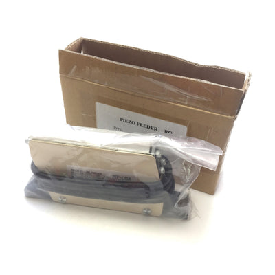 New Sanki Piezo PEF-L15A Vibratory In-line Feeder, Input: 250VAC 300Hz, Mass: 0.8kg