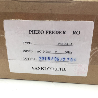 New Sanki Piezo PEF-L15A Vibratory In-line Feeder, Input: 250VAC 300Hz, Mass: 0.8kg