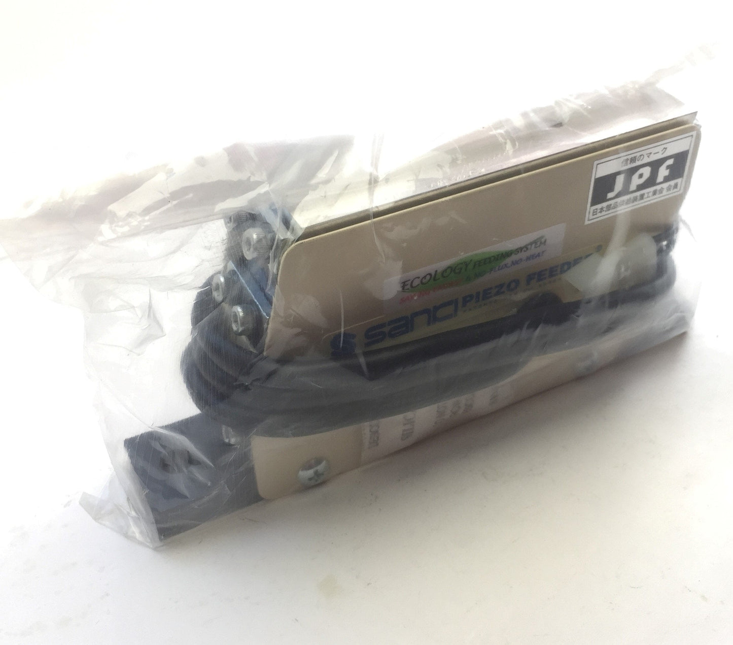 New Sanki Piezo PEF-L15A Vibratory In-line Feeder, Input: 250VAC 300Hz, Mass: 0.8kg