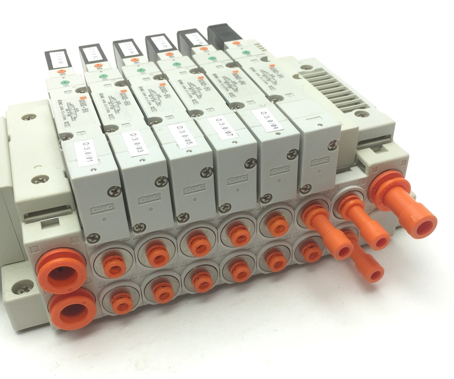 Used SMC Manifold w/ 6x SV2400-5FU Pneumatic Solenoid Valves, Coil Voltage: 24VDC