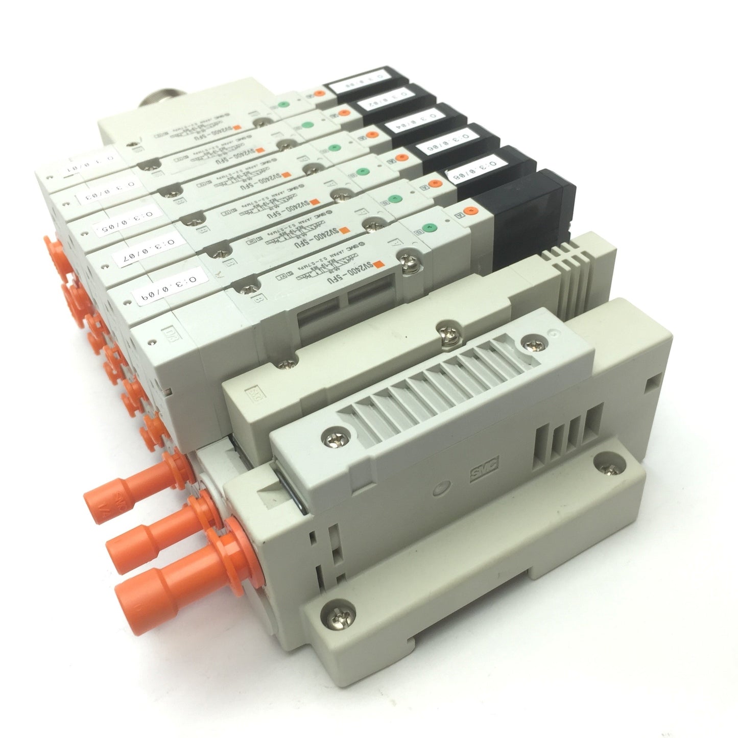 Used SMC Manifold w/ 6x SV2400-5FU Pneumatic Solenoid Valves, Coil Voltage: 24VDC