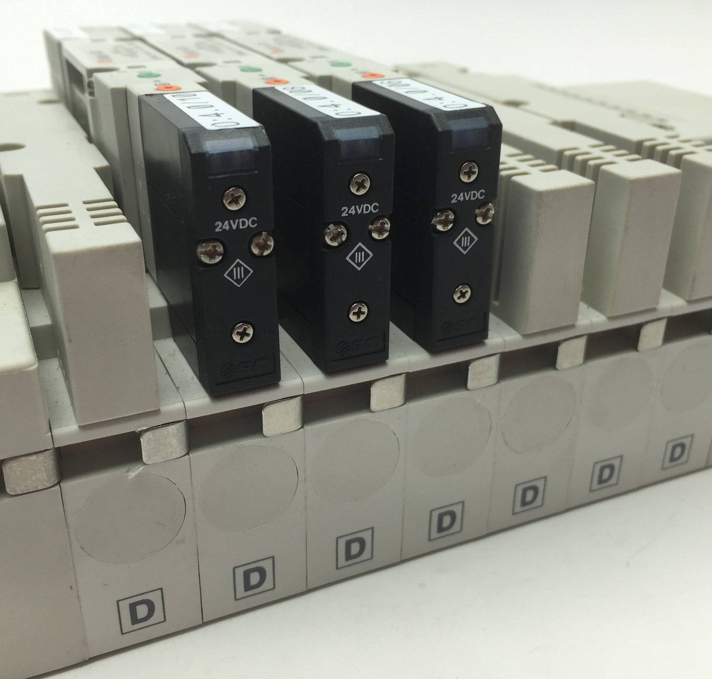 Used SMC Manifold w/ 3x SV2400-5FU Pneumatic Solenoid Valves, Coil Voltage: 24VDC