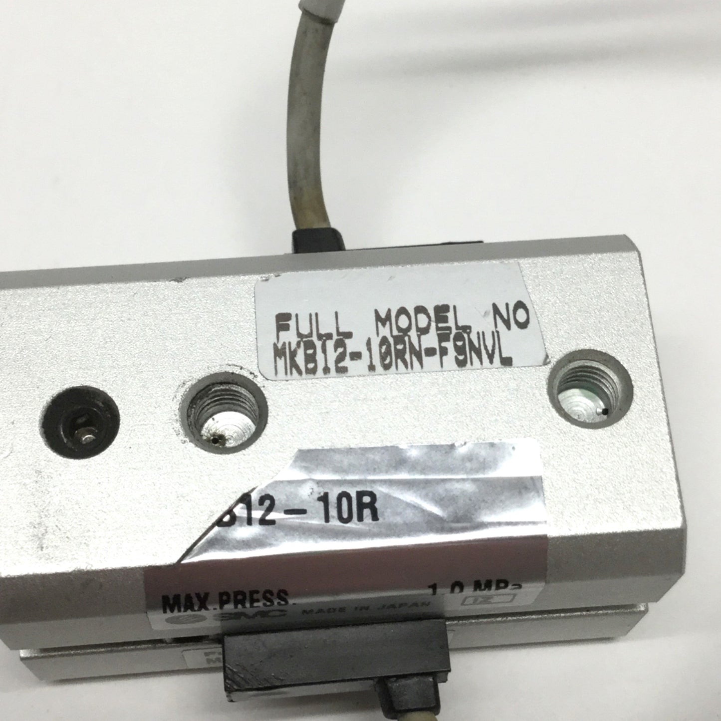 Used SMC MKB12-10RN-F9NVL Rotary Clamp Cylinder 12mm Bore, 10mm Stroke, 90° Clockwise