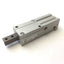 Used SMC MIS20-20D1 Escapement Single Finger Type Pneumatic, Bore: 20mm Stroke: 20mm