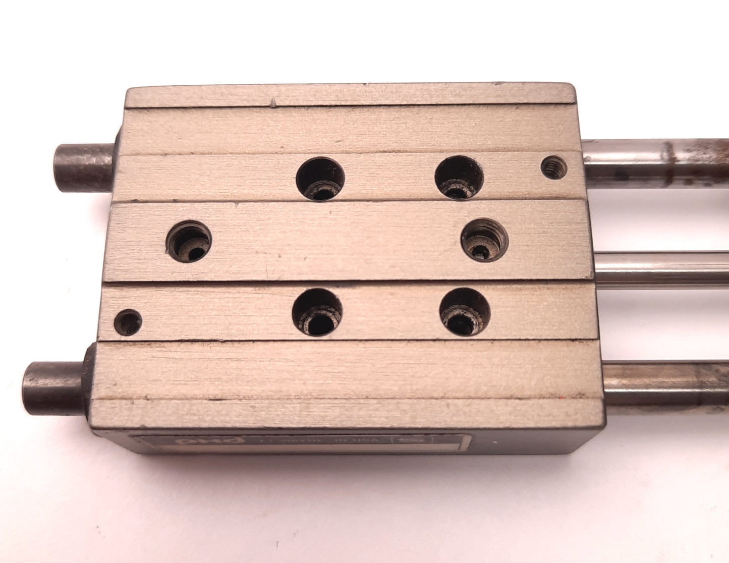 Used PHD SA022X1-J2-304 Compact Thruster Slide 1" Travel, M5x0.8 Ports, Tool Plate