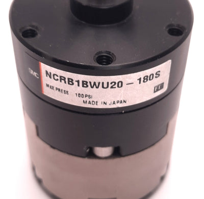 Used SMC NCRB1BWU20-180S Adjustable Rotary Actuator 180 Deg, 20mm Size, 10-32 Ports