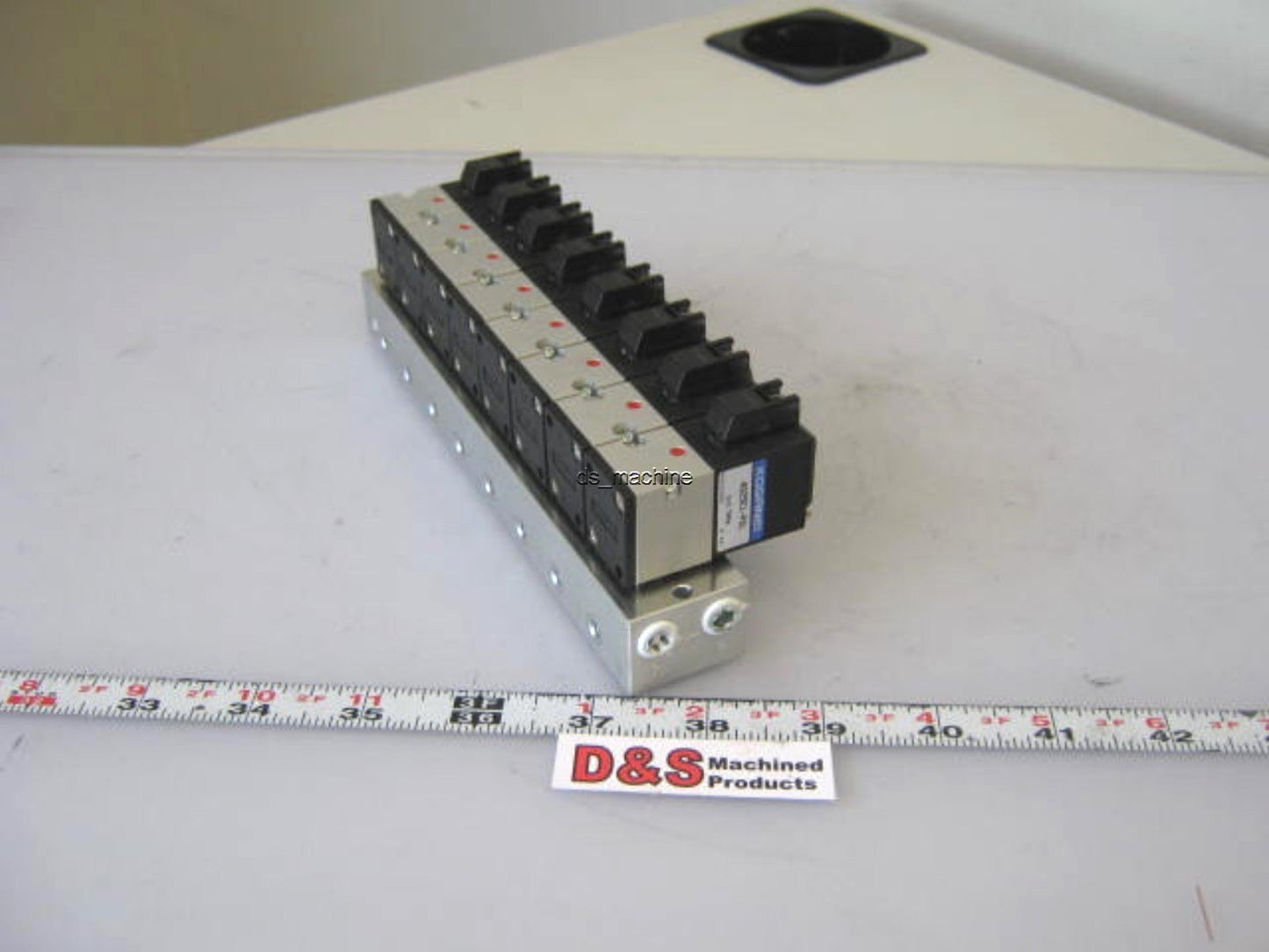 Used Bank of 8 Koganei A025E1-PSL Pneumatic Solenoids 24VDC w/Slight Damage