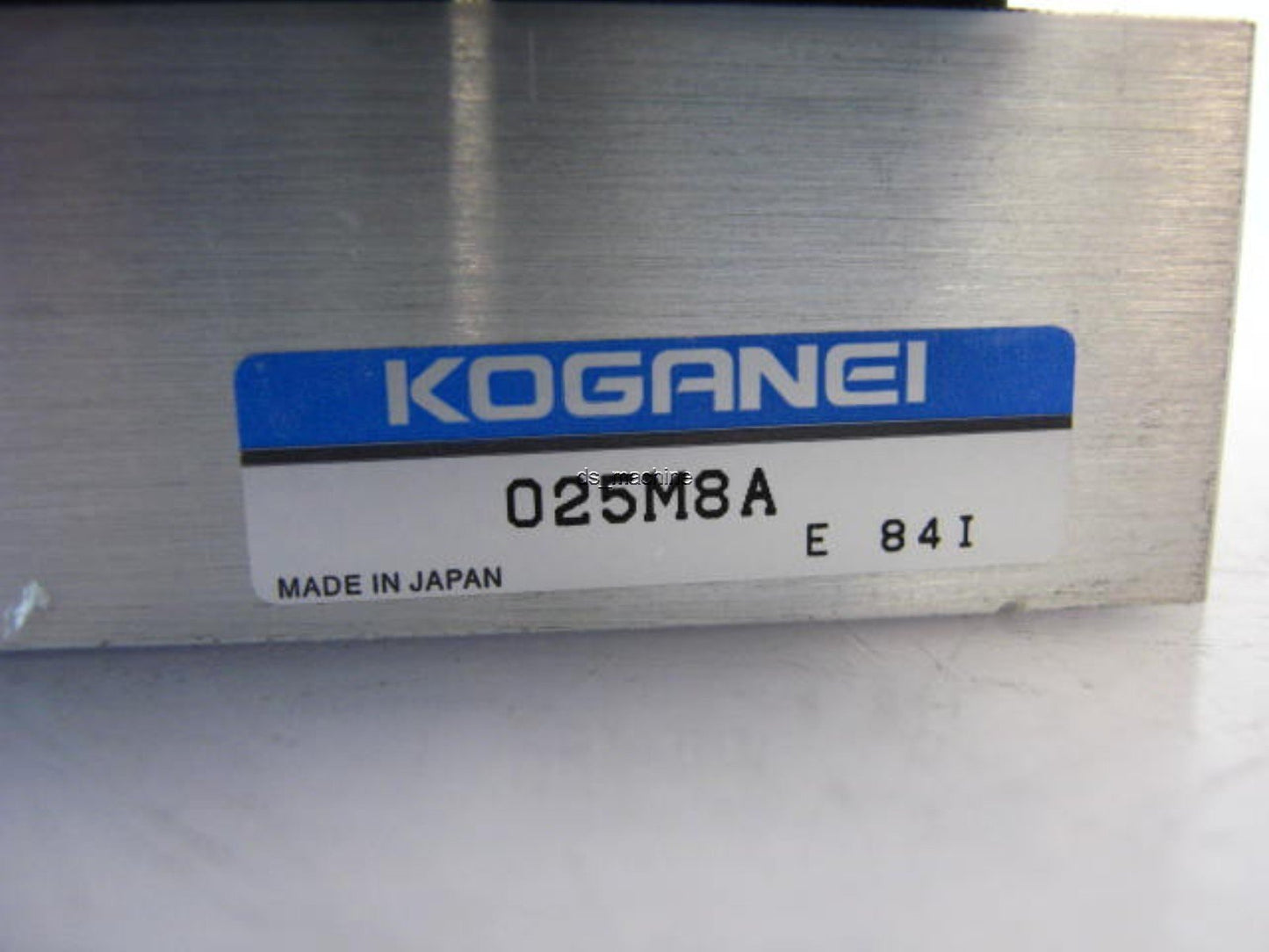 Used Bank of 8 Koganei A025E1-PSL Pneumatic Solenoids 24VDC w/Slight Damage