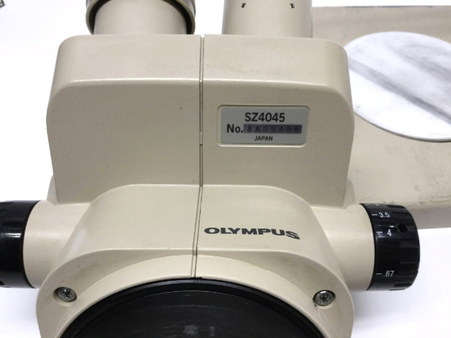 Used Olympus SZ4045 Binocular Stereo Microscope 0.67-4X Zoom w/ 10X Eyepieces & Stand