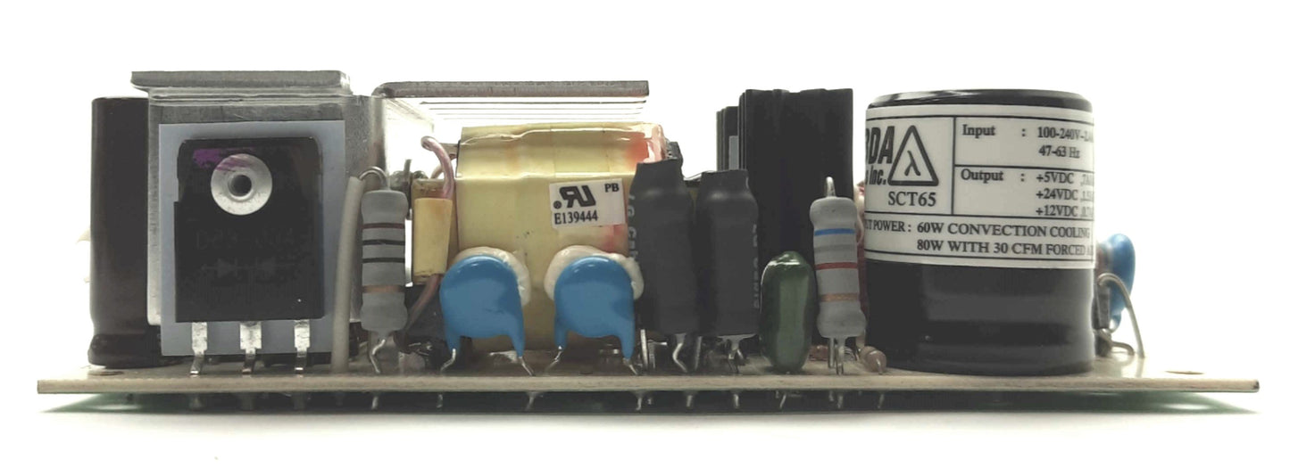 Used Lamda SCT65 DC Power Supply Out: 5V 7A, 24V 1.5A, 12V .7A In: 100-240VAC 2.4A