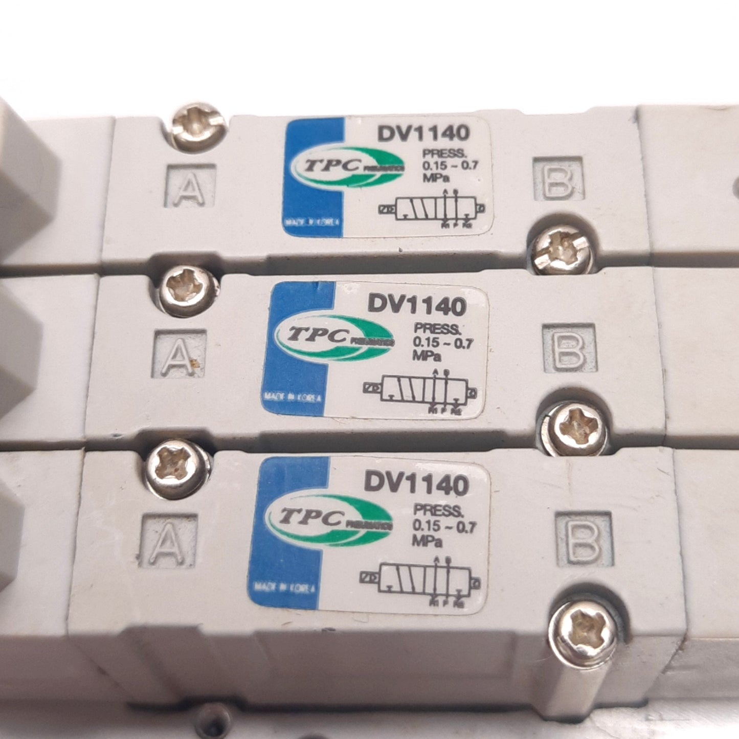 Used TPC DV1140 Solenoid Valves (x3) with Manifold, 24VDC Coil, 5-Port 2-Position