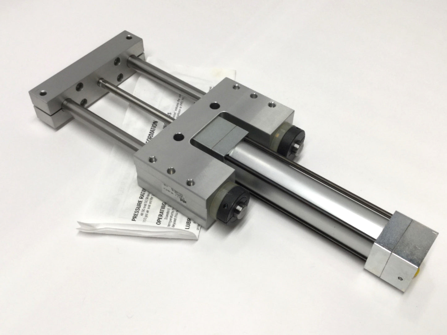 New – Open box PHD SDC23X4-AE-DB-E-PB Pneumatic Thruster Slide, 1" Bore, 4" Stroke, 1/8" NPT