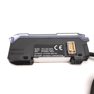 Used Keyence FS-V34P Fiber Optic Sensor Amplifier, 12-24VDC, 2x PNP Outputs, DIN Rail