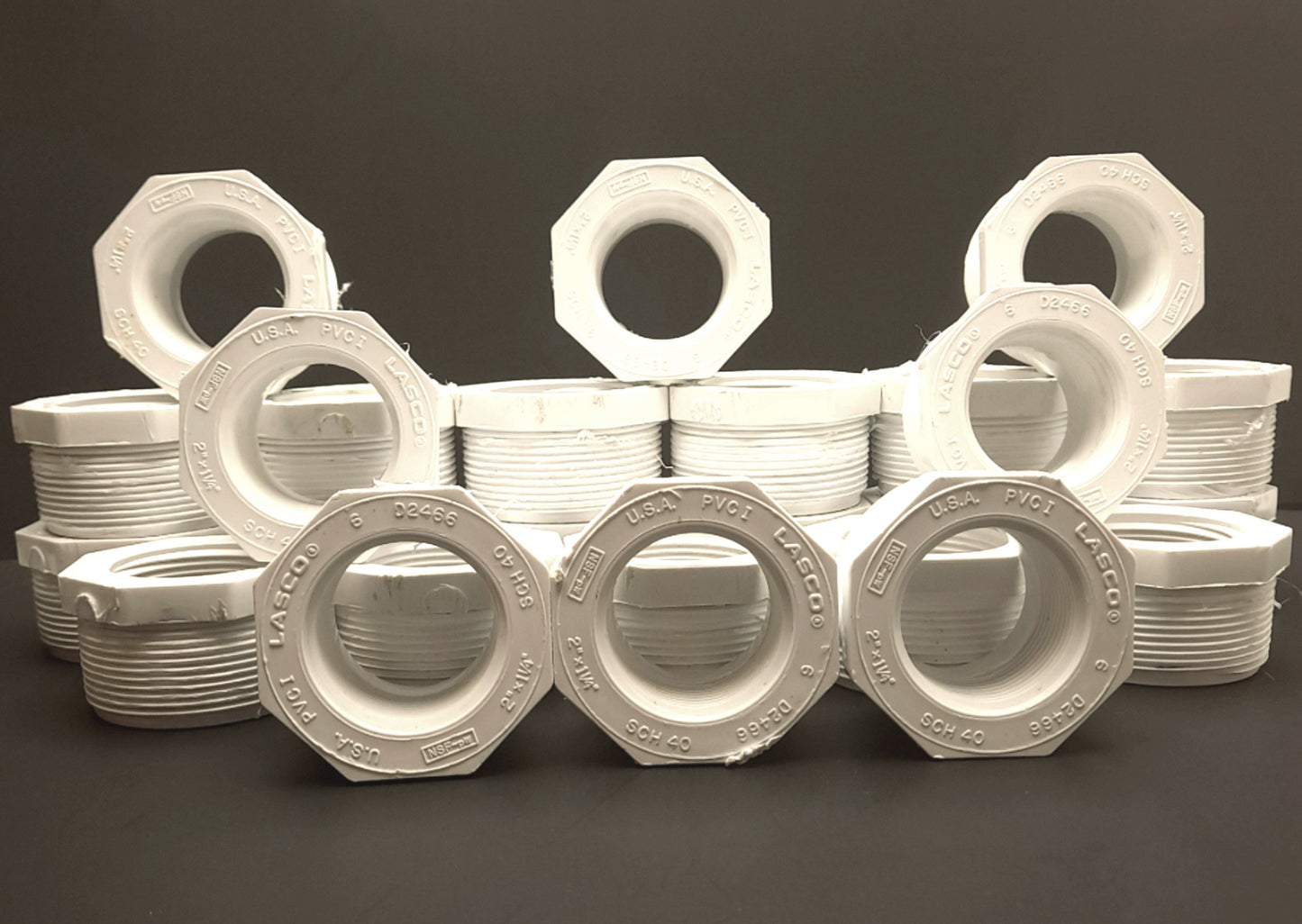 Used Lot of 25 LASCO 439-250 Reducer Bushing, 2" FPT to 1-1/4" MPT, D2466 PVC, SCH 40