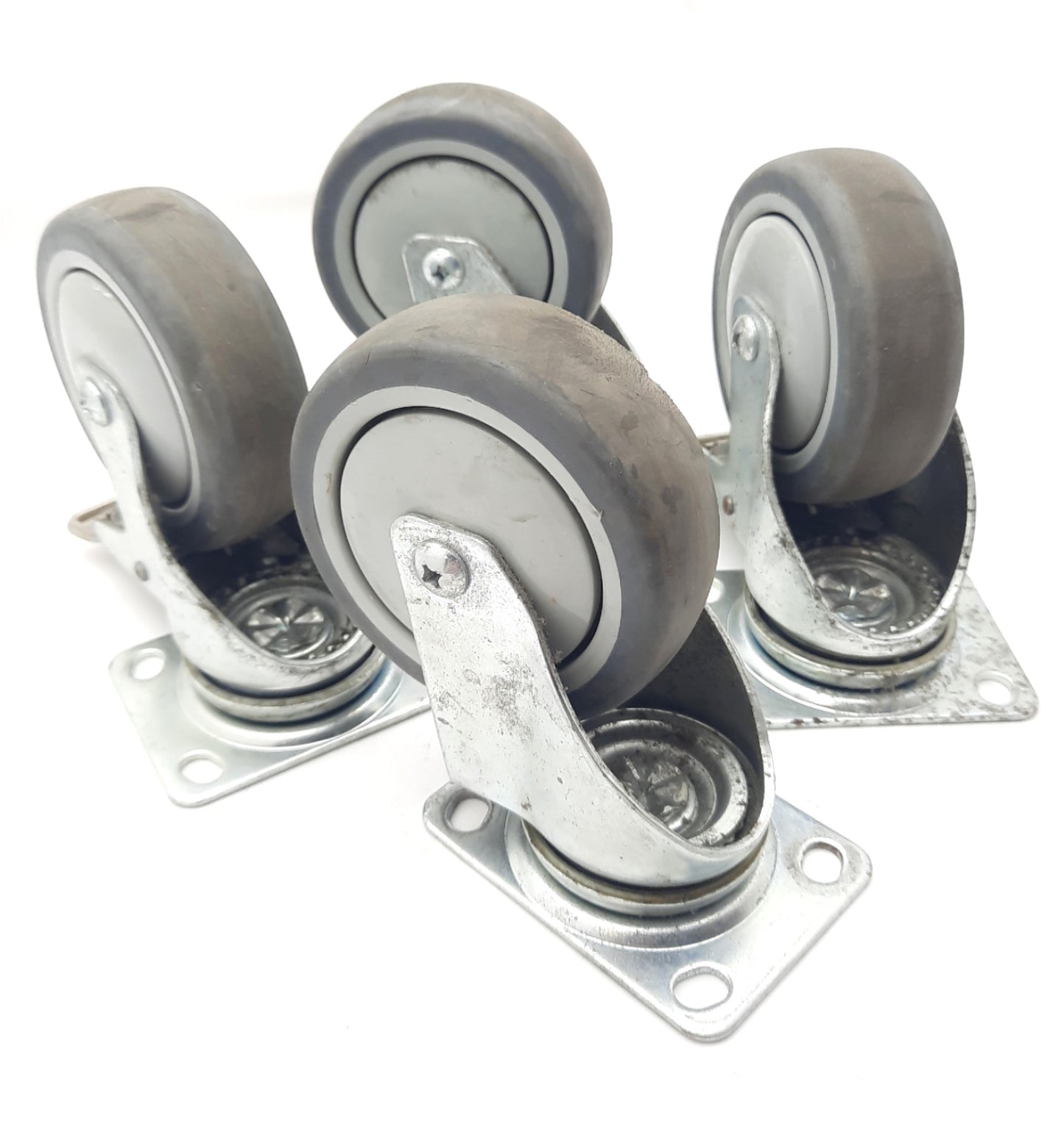 Used Lot of 4 Rubber Swivel Casters Diam. 100mm, Thickness 31mm, Overall Height 134mm