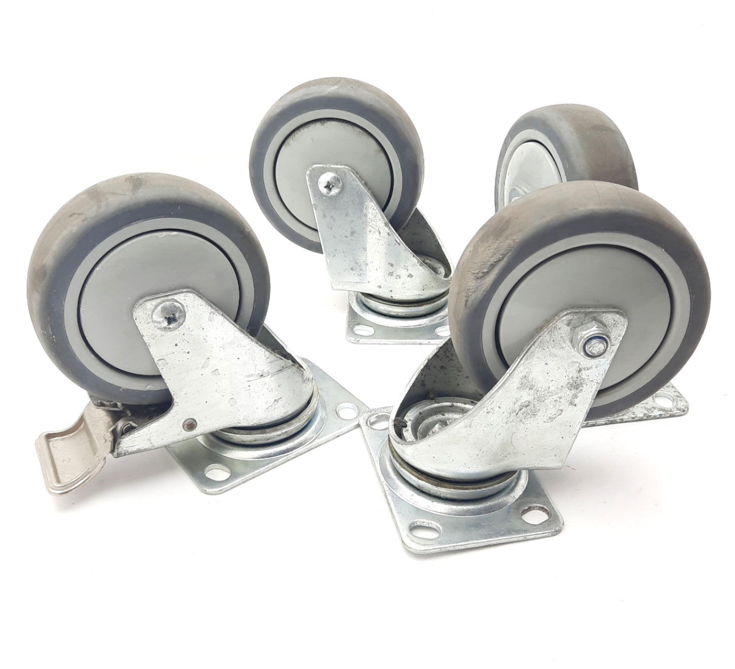 Used Lot of 4 Rubber Swivel Casters Diam. 100mm, Thickness 31mm, Overall Height 134mm