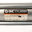 Used SMC NCDA1B200-0800NA Double Rod Cylinder 2" Bore, 8" Stroke, 8-250psi, 3/8"NPT