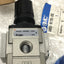 New SMC AW20-N02BE-CRZ Pressure Regulator/Filter, 1/4" NPT, 7-125psi, Built-In Gauge