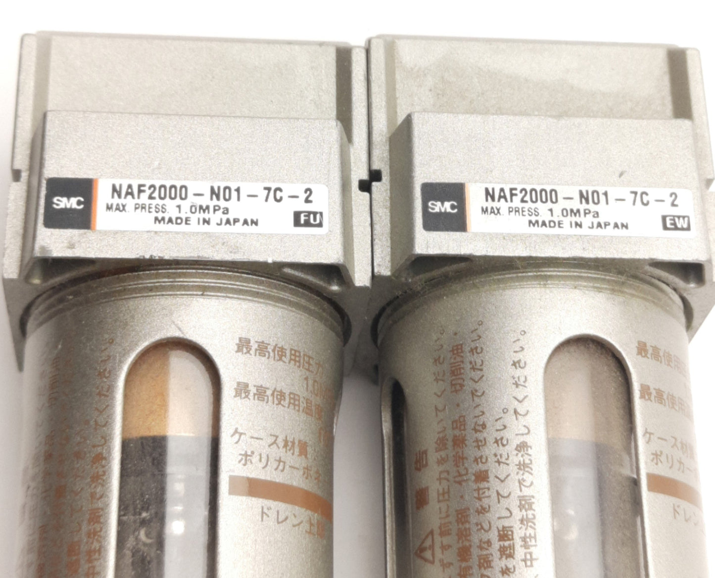 Used Lot of 2 SMC NAF2000-N01-7C-2 Air Filter 1/8" NPT, 1MPa Max, 5µm Filtration