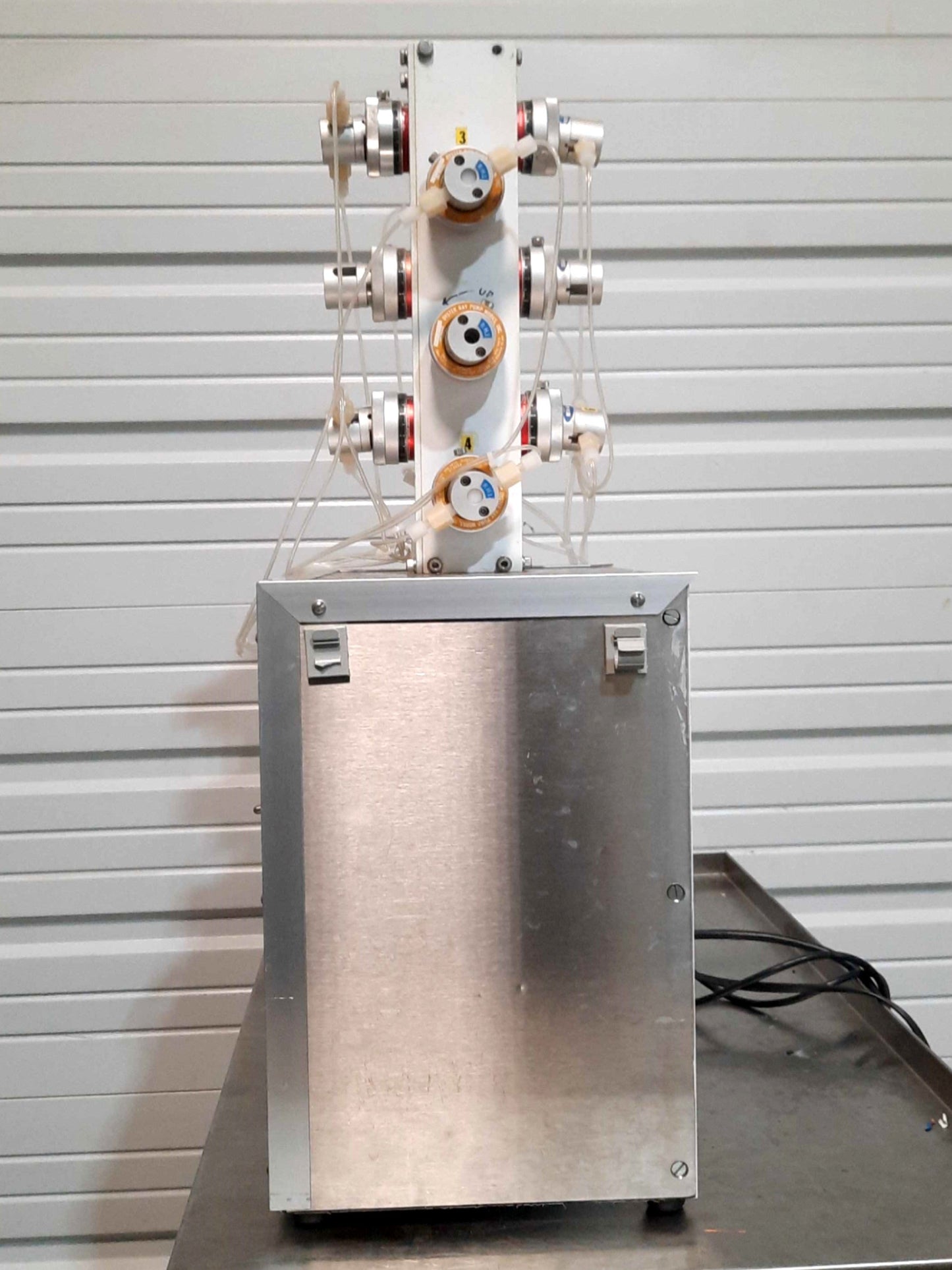 Used Carl Creative Systems Precision Fluid Dispenser 12-Channel 13-260ml/min 120VAC