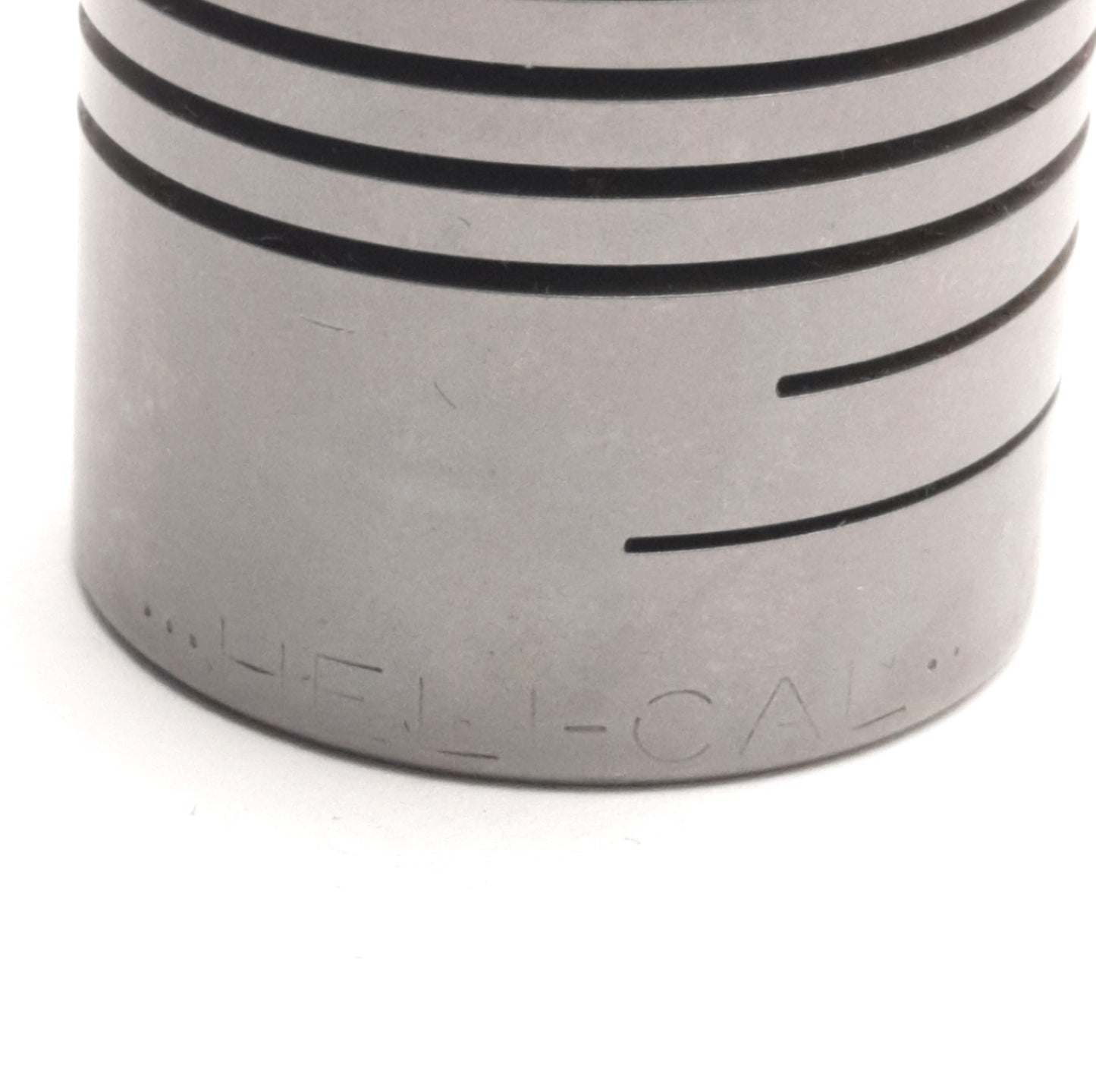 Used Helical HCR112-12-8 Flexible Coupling, 3/8" x 1/4" Bores, 1.5" length, 1.125" OD