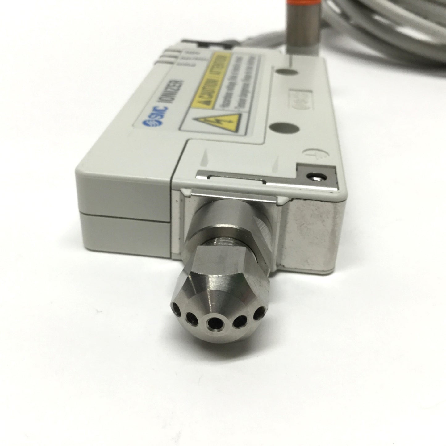 Used SMC IZN10E-11P17 Air Ionizer Body, 24VDC, PNP, 2.5kVAC w/Flat Diffusion Nozzle