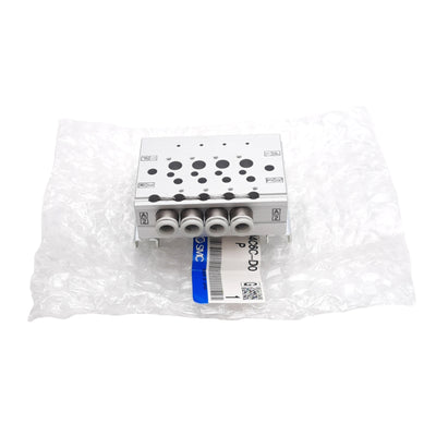 New SMC VV3QZ15-04C6C-D0P Pneumatic Manifold, 4 Stations, ø6mm One-Touch, Rc1/8 Port