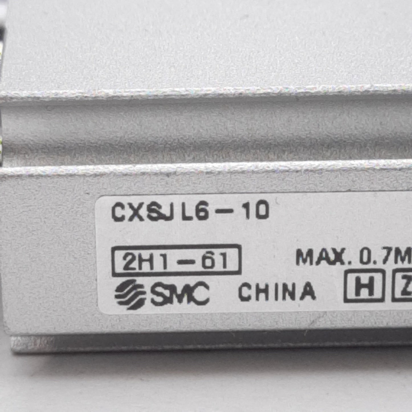 Used SMC CXSJL6-10 Compact Dual Rod Cylinder, Bore: 6mm, Stroke: 10mm, 0.7MPa, M3x0.5