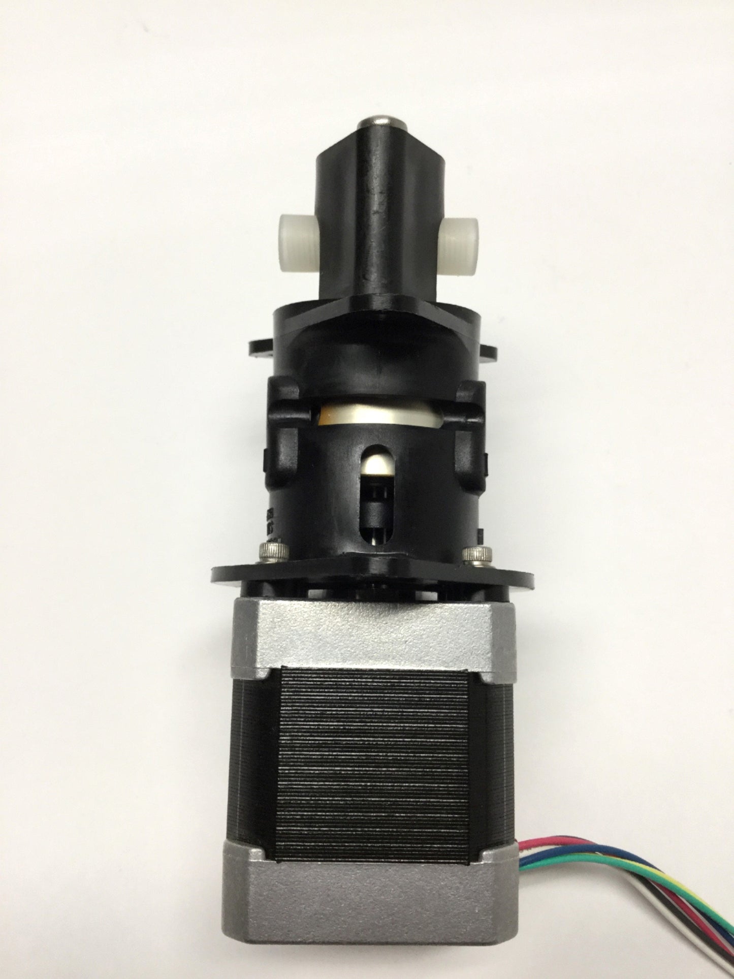 Used FMI STH Low Flow Fluid Metering Pump Assembly w/ 4VDC 1.8° Stepper Motor