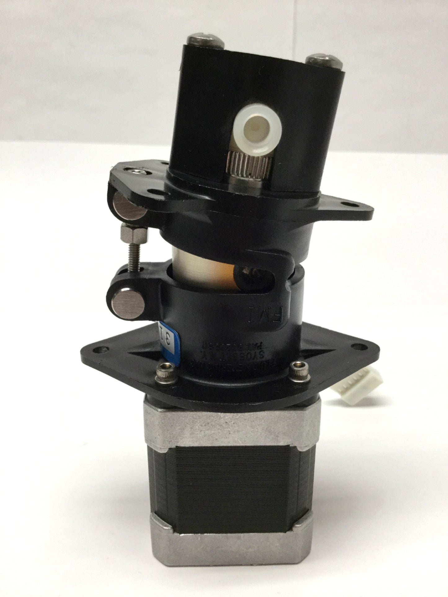Used FMI STH Low Flow Fluid Metering Pump Assembly w/ 4VDC 1.8° Stepper Motor