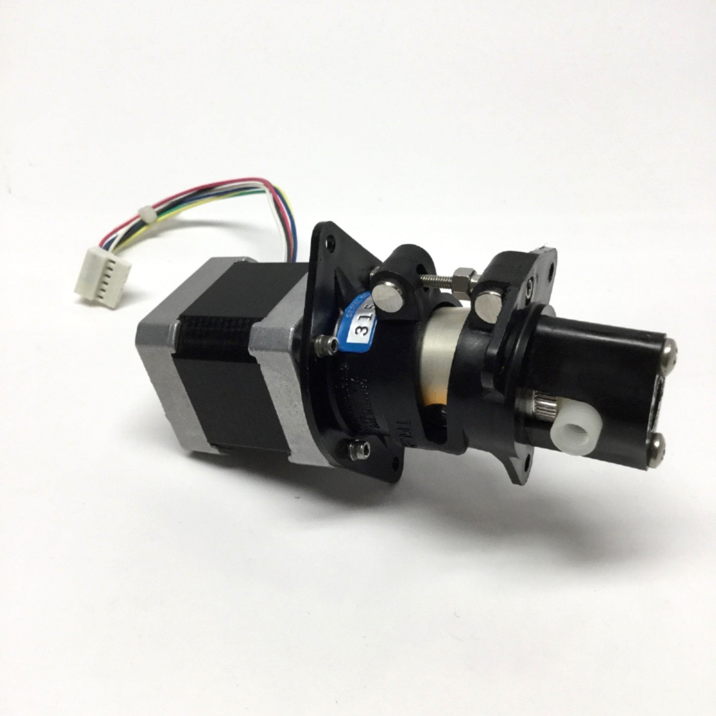 Used FMI STH Low Flow Fluid Metering Pump Assembly w/ 4VDC 1.8° Stepper Motor