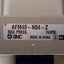 Used SMC AFM40-N04-Z Mist Separator Module, 1/2in NPT Ports, 150psi, 0.3µm Filtration