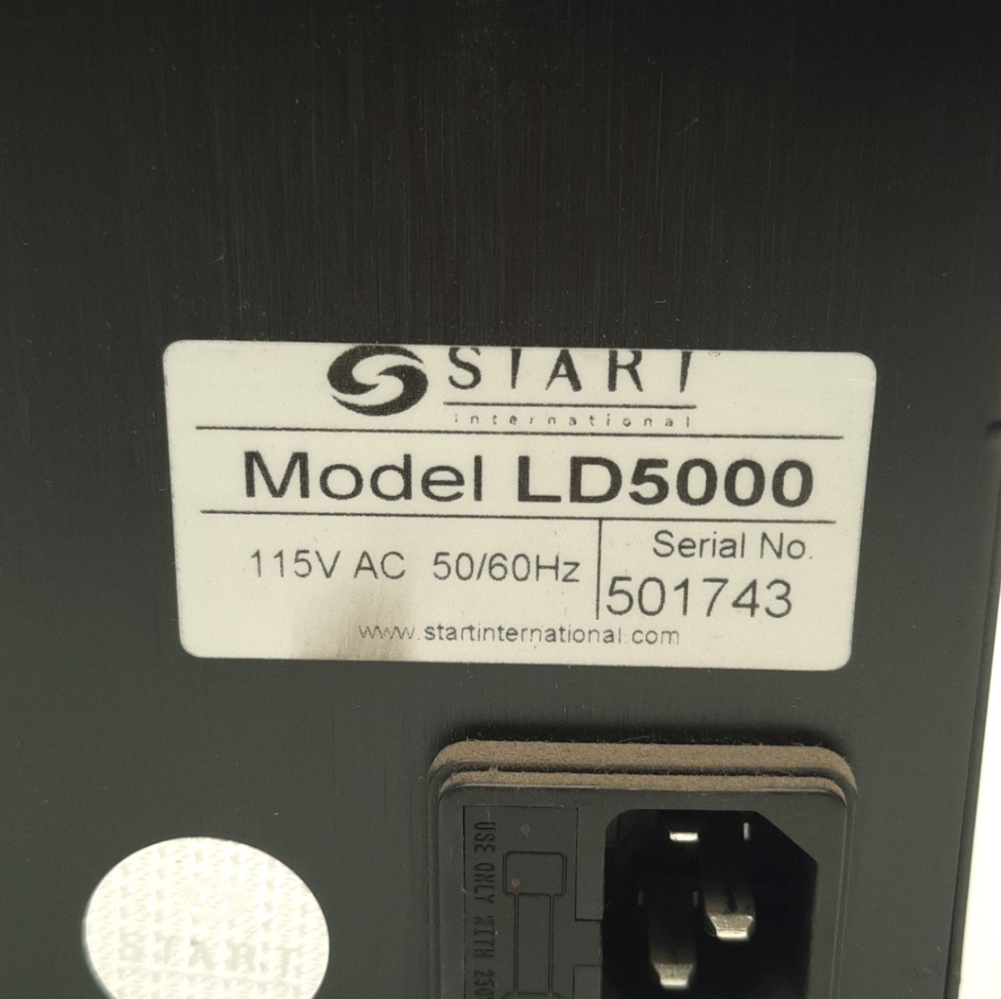 Used Start International LD5000 Automatic Label Dispenser, 7" Per Second Max, 120VAC