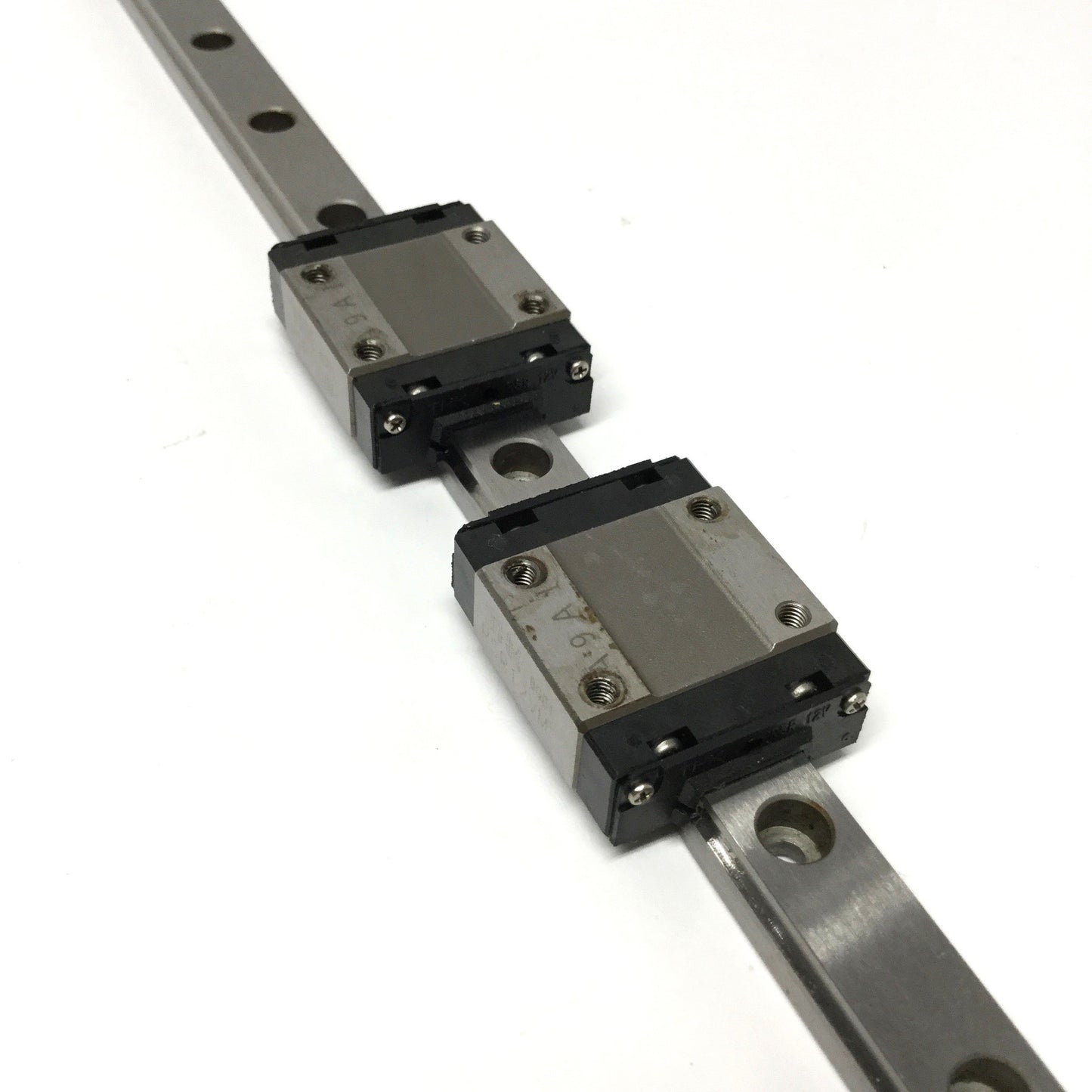 Used THK RSR12VM Roller Guide Linear Ball Bearing Slide Carriages (x2) on 415mm Rail