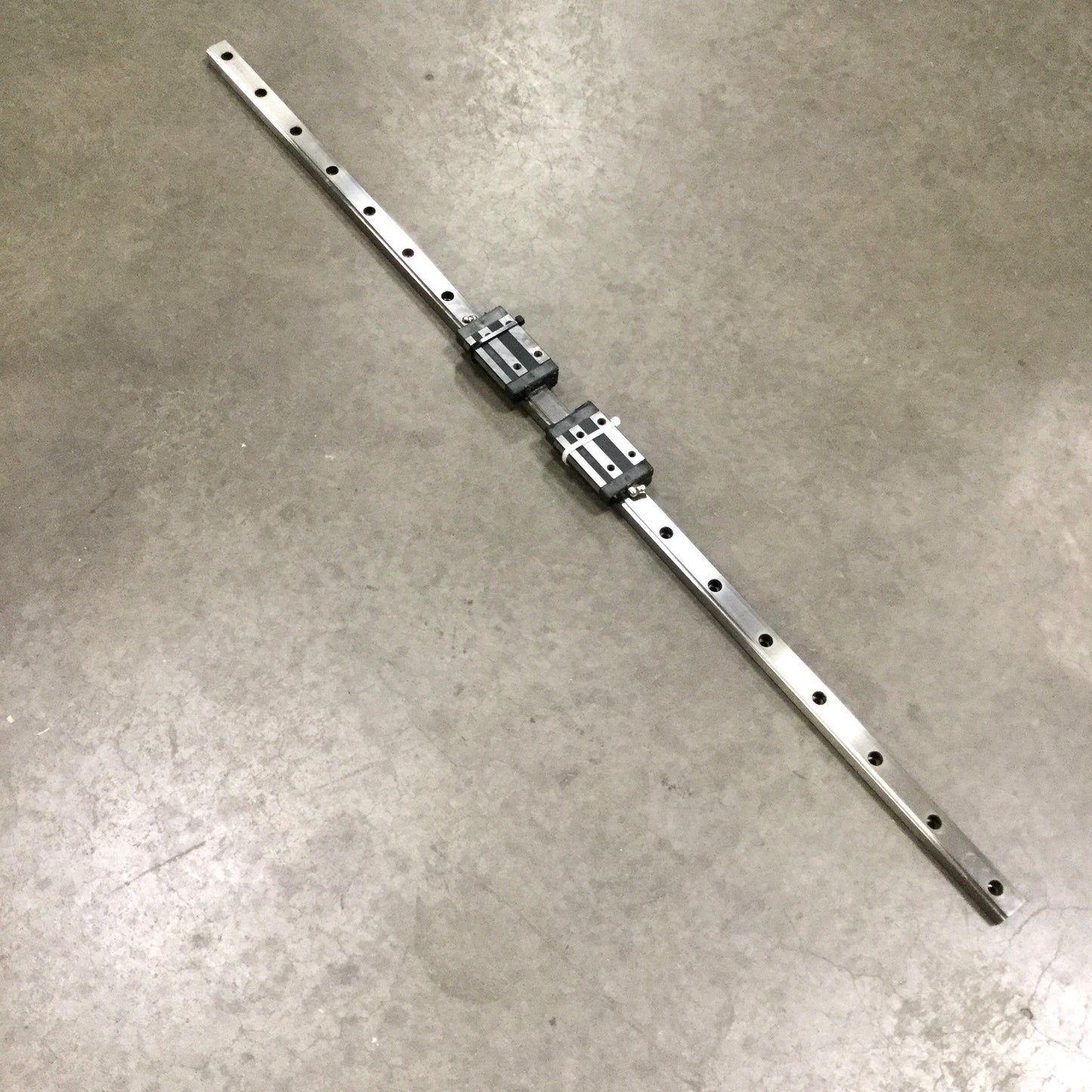 Used THK GSR25T Linear Ball Bearing Radial Slide Carriages (x2) on 1060mm Guide Rail