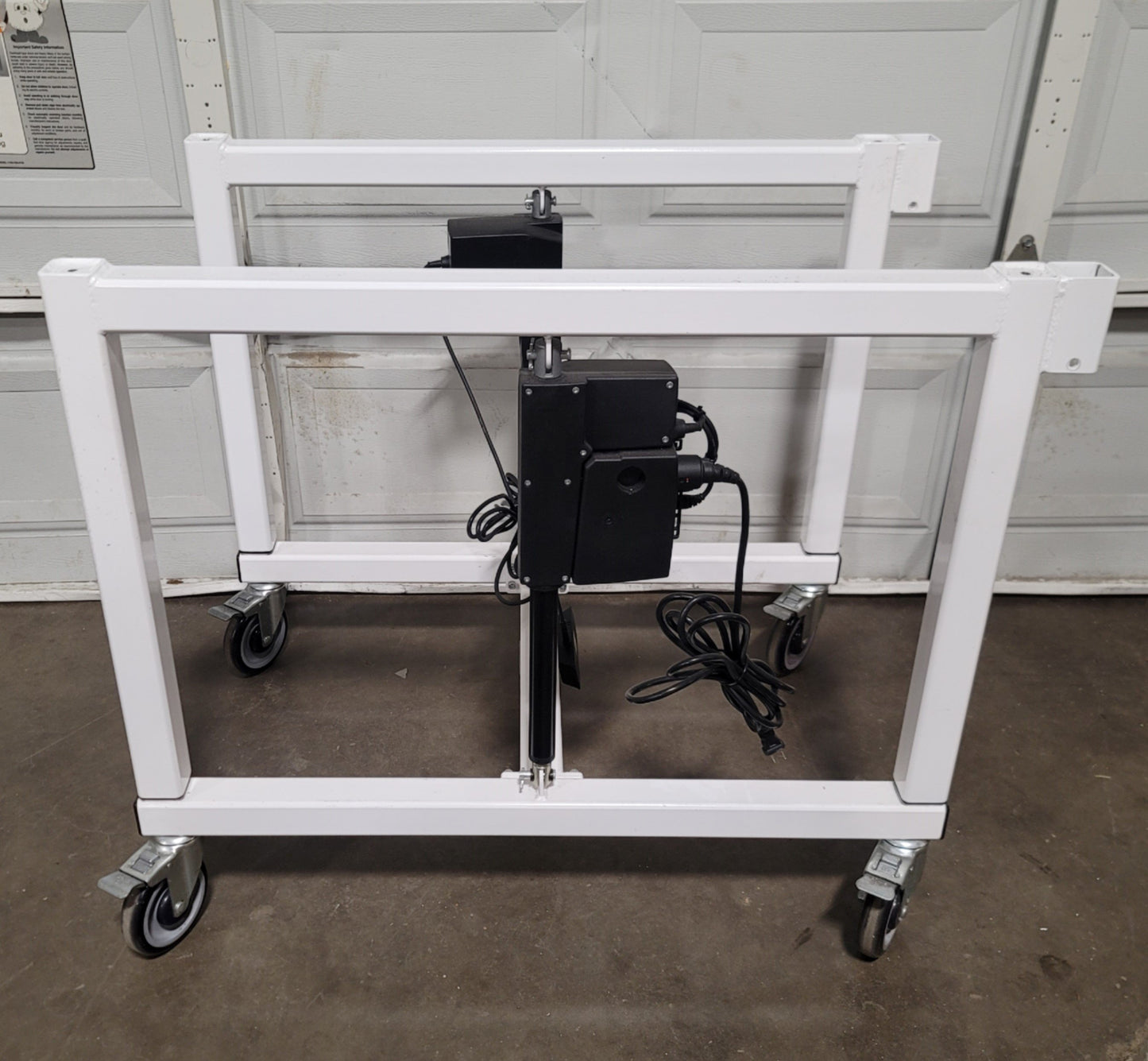 Used LTW E2 Ergonomic Adjustable Height Industrial Machine Base 24"W x 36"D, 12" Lift