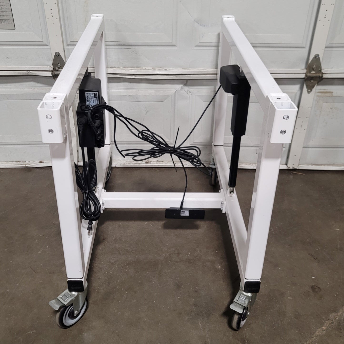 Used LTW E2 Ergonomic Adjustable Height Industrial Machine Base 24"W x 36"D, 12" Lift