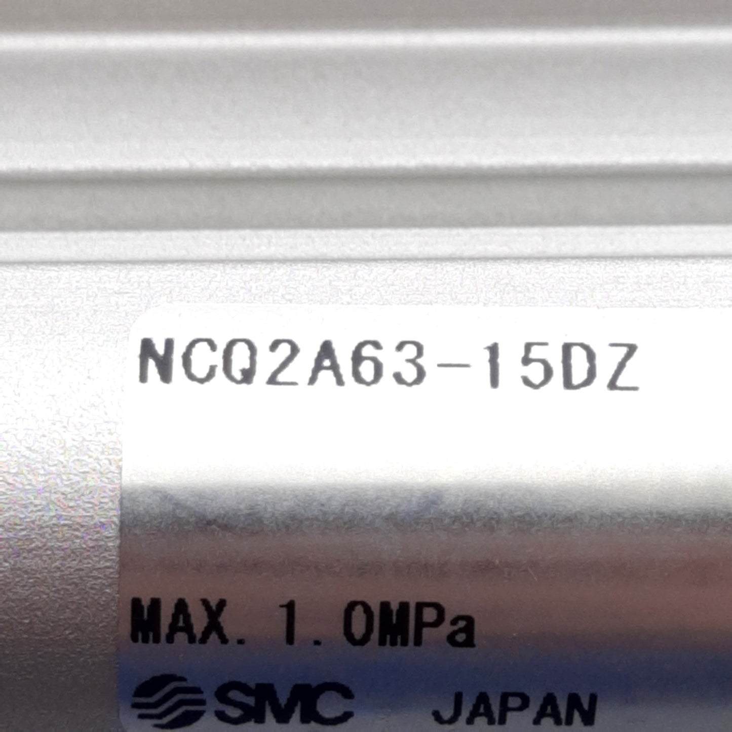 Used SMC NCQ2A63-15DZ Compact Cylinder, ø63mm Bore, 15mm Stroke, 145PSI, NPT1/4 Ports