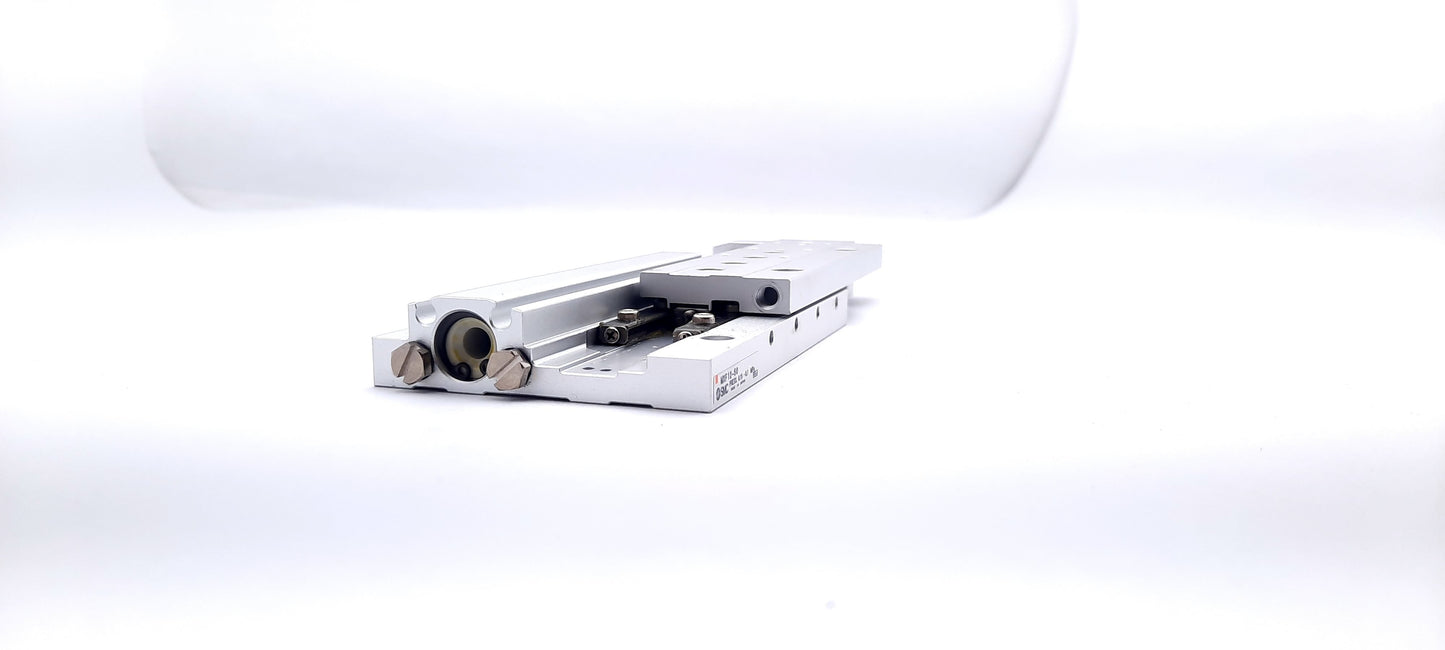 Used SMC MXF12-50 Low Profile Slide Table, 50mm Stroke, 12mm Bore, 22 - 102 PSI