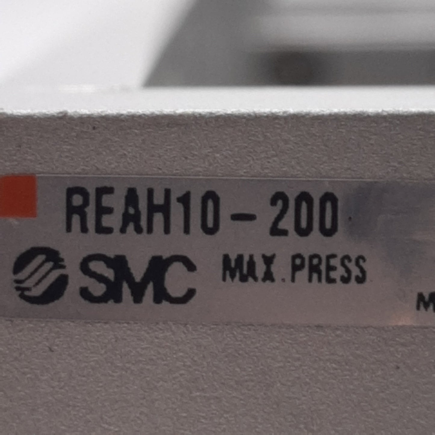 Used SMC REAH10-200 Sine Rodless Cylinder, ø10mm Bore, 200mm Stroke, 0.7MPa, M5 Ports