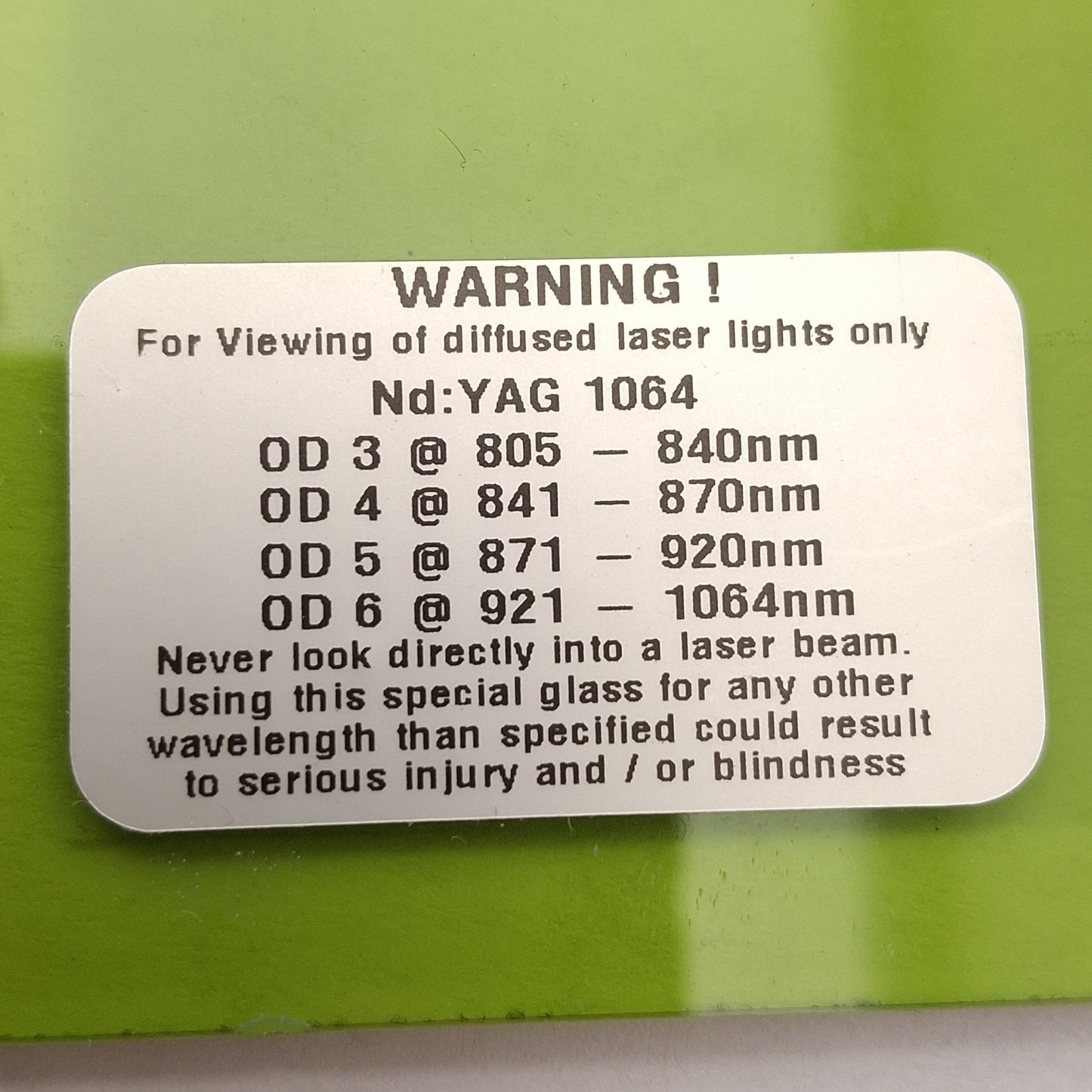Used Acrylic Laser Safety Window, Nd:YAG 1064nm, 12-1/8 x 4-9/16 x 1/8in, OD 3-6